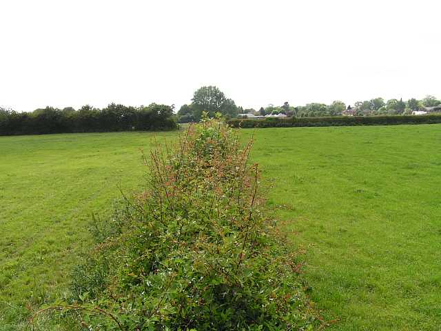 Near the centre of the airfield.