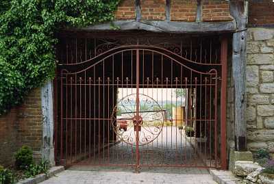 Ornate gate made by Gommes Forge